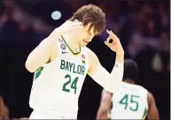  ?? Tim Nwachukwu / Getty Images ?? Baylor’s Matthew Mayer reacts against Houston during the Final Four at Lucas Oil Stadium in Indianapol­is on Saturday.