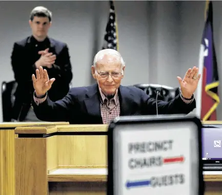  ?? Karen Warren / Staff photograph­er ?? Wally Wilkerson, chairman of the Montgomery County Republican Party, is greeted by a standing ovation as he walks to the lectern at a meeting this month. Wilkerson has been in the role for 56 years and is credited with building up the party.