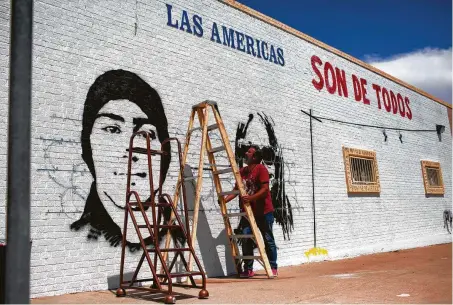  ?? Marie D. De Jesús / Staff photograph­er ?? Manuel Oliver paints a mural in El Paso in honor of his son, Joaquin, a Marjory Stoneman Douglas High School student who was killed in the 2018 shooting, in a rebuke to the president’s anti-immigrant rhetoric. His son would have been 19 on Sunday.