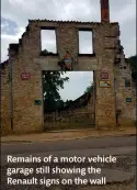  ?? ?? Remains of a motor vehicle garage still showing the Renault signs on the wall