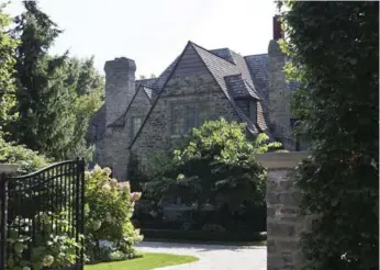  ??  ?? The Chapniks’ home at 33 Strathearn Rd. was built in 1935. Renovation­s in 2007 doubled its size.