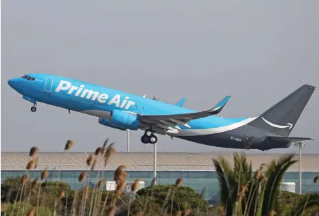  ?? Getty ?? An Amazon cargo plane takes off from Barcelona. The e-commerce company launched Amazon Air in India this month