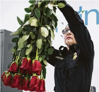  ?? Brett Coomer / Staff photograph­er ?? Customs and Border Protection agricultur­e specialist Gisel Medina Bobe inspects a flower shipment from Colombia on Tuesday at George Bush Interconti­nental Airport.
