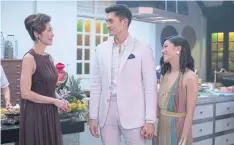  ??  ?? From left, Michelle Yeoh, Henry Golding and Constance Wu in Crazy Rich Asians.