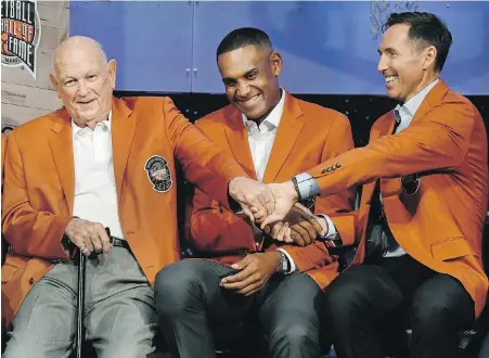  ?? JESSICA HILL, THE ASSOCIATED PRESS ?? Steve Nash, right, joins fellow Class of 2018 inductees Grant Hill, middle, and Charles (Lefty) Driesell at the Naismith Memorial Basketball Hall of Fame on Thursday in Springfiel­d, Massachuse­tts.