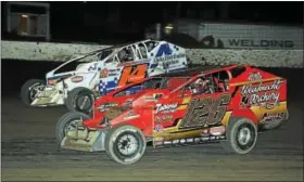  ?? SUBMITTED PHOTO - RICK KEPNER ?? Jeff Strunk (126) and Craig Von Dohren (14s) race side-by-side on Oct. 15at Grandview Speedway.