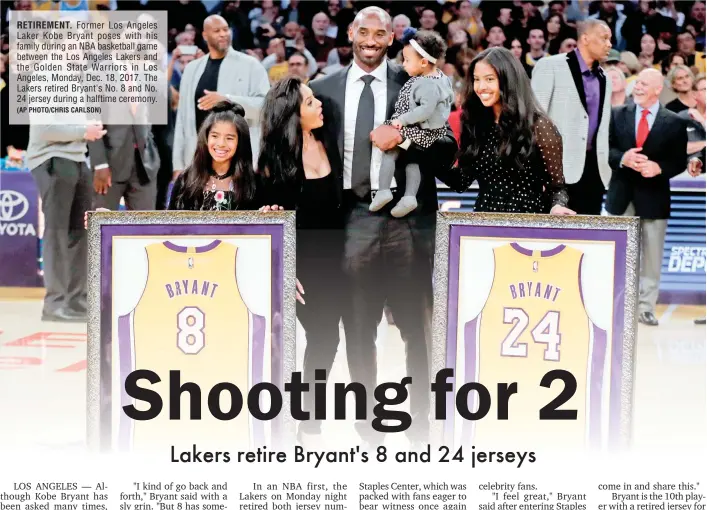  ?? (AP PHOTO/CHRIS CARLSON) ?? RETIREMENT. Former Los Angeles Laker Kobe Bryant poses with his family during an NBA basketball game between the Los Angeles Lakers and the Golden State Warriors in Los Angeles, Monday, Dec. 18, 2017. The Lakers retired Bryant's No. 8 and No. 24 jersey...
