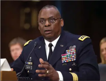  ?? The Associated Press ?? DEFENSE: In this Sept. 16, 2015, photo, U.S. Central Command Commander Gen. Lloyd Austin III, testifies on Capitol Hill in Washington. Biden will nominate retired four-star Army general Lloyd J. Austin to be secretary of defense. That’s according to three people familiar with the decision who spoke on condition of anonymity because the selection hadn’t been formally announced.