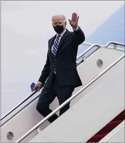  ?? ASSOCIATED PRESS ?? President Joe Biden waves as he arrives on Air Force One Tuesday at Philadelph­ia Internatio­nal Airport.