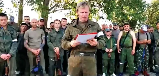  ?? ?? Complaints from the front: The commander of the Donetsk People’s Republic army’s 113th rifle regiment on film