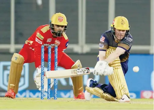  ?? Courtesy: IPL ?? ↑
Kolkata Knight Riders’ skipper Eion Morgan plays a shot against Punjab Kings during their IPL match on Monday.