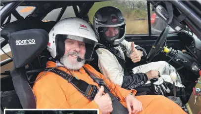  ?? PHOTOS: PETER MCINTOSH ?? Strapped in and ready . . Aaron Slight (right) and Gary Newton give a thumbsup before a run through Flagstaff Forest yesterday.