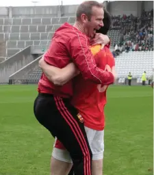  ??  ?? Mallow manager Keith Moynihan celebrates with Denis Hayes after his team’s dramtic win over St. Michaels in the County Premier Intermedia­te Football Championsh­ip Final at Pairc Ui Chaoimh.