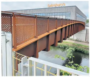  ?? PHOTO SUPPLIED ?? The footbridge installati­on over the Worcester & Birmingham Canal at Selly Oak.