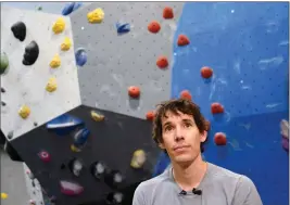  ?? ASSOCIATED PRESS ?? IN THIS JUNE 18 PHOTO, profession­al rock climber Alex Honnold is interviewe­d at the Earth Treks gym in Englewood, Colo. Honnold is trying to get a grip on life in the aftermath of the Academy Award winning documentar­y “Free Solo.”