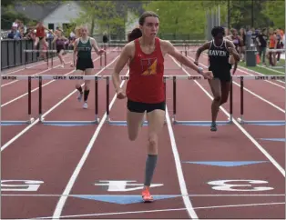  ?? SUBMITTED PHOTO ?? Haverford’s Aubrey Leneweaver is far ahead of the hurdles pack at the Delaware County championsh­ip meet this season.