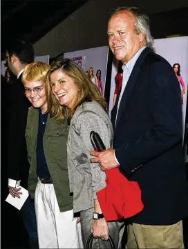  ?? PAUL HAWTHORNE/GETTY IMAGES/TNS ?? Dick Ebersol (then NBC Sports chief) attends a private movie screening in April 2004 with his wife, actress Susan Saint James, and son Teddy, who was 14 years old when he died in a plane crash that year.