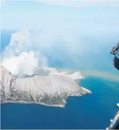  ?? Photo / File ?? Whakaari / White Island in the hours after the December 9 eruption.