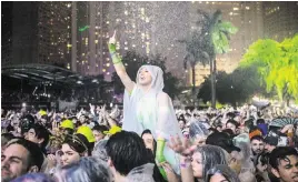  ?? D.A. VARELA dvarela@miamiheral­d.com ?? A woman enjoys the Ultra Music Festival on Friday. If the decibels get too intense, monitors send an alert to Ultra organizers, the president of the Downtown Neighbors Alliance says.