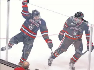  ?? CP PHOTO ?? Northeaste­rn forward Dylan Sikura (left) celebrates scoring a goal with Ryan Shea against the Boston College at the Beanpot college hockey tournament in Boston in this file photo from last February.