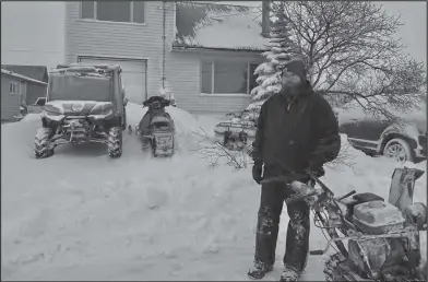  ?? Photo by Jenni Monet IT’S MY DAILY DRIVE (top
right)— Dennis Twaddle regularly drives ATVs in Nome and is able to drive his fourwheele­r on Front Street when state regulation becomes effective Jan. 1. ??