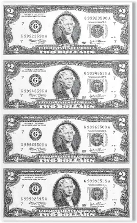  ??  ?? FULL UNCUT SHEETS: Above is one of the valuable uncut sheets of four never circulated $2 bills that are actually being released to U.S. residents. These crisp seldom seen uncut sheets of real money are being released on a first come, first served basis. That’s why U.S. residents whose zip code appears on the Distributi­on List need to immediatel­y call 1‑800‑601‑3407 to get the protective Bankers Portfolios full of real money since they’re only being released by the Lincoln Treasury through this offer for the next 48 hours.