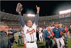  ?? AP-Tannen Maury, File ?? Atlanta Braves outfielder David Justice waves to the crowd after the Braves defeated the Cleveland Indians in Game Six of the World Series, on Saturday, Oct. 28, 1995, in Atlanta. The Braves won the best-of-seven series with the 1-0 victory.