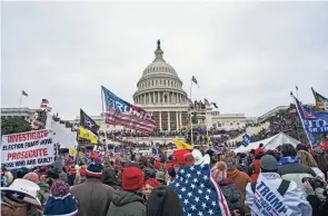  ?? JOSE LUIS MAGANA/AP FILE ?? People storm the U.S. Capitol on Jan. 6, 2021. House Republican leader Kevin Mccarthy told fellow GOP lawmakers shortly after the Jan. 6, 2021, Capitol insurrecti­on that he would urge then-president Donald Trump to resign, according to audio posted by The New York Times