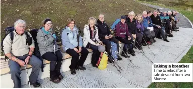  ??  ?? Taking a breather Time to relax after a safe descent from two Munros