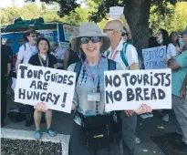  ?? (Courtesy) ?? TOUR GUIDE Debra Nussbaum Stepen at a protest in Jerusalem yesterday against ending economic benefits.