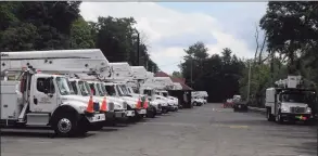  ?? Macklin Reid / Hearst Connecticu­t Media ?? Utility trucks parked at Branchvill­e Station Aug. 9, six days after Storm Isaias, awaiting instructio­ns on how to help. A new ruling from the state calls for more cooperatio­n between the utilities and town authoritie­s.