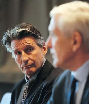  ?? — GETTY IMAGES ?? Internatio­nal Associatio­n of Athletics Federation­s (IAAF) president Sebastian Coe, left, and the independen­t chairperso­n of the IAAF task force for Russia, Rune Andersen, discuss their decision in Monaco on Monday.