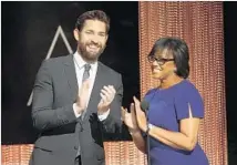  ?? Al Seib Los Angeles Times ?? ACADEMY’S Cheryl Boone Isaacs, with actor John Krasinski applauding nominees, hoped the nods would be more inclusive.
