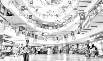  ??  ?? PH’s 1GE14 manifesto is a catalyst for a recovery in consumer spending which reduces occupancy risks at the malls, analysts observed. — AFP photo