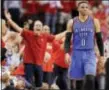  ?? ERIC CHRISTIAN SMITH — THE ASSOCIATED PRESS ?? Oklahoma City’s Russell Westbrook walks down the court in the final seconds of Game 2 against the Rockets Wednesday in Houston.