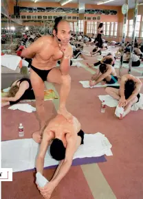  ??  ?? THE UNORTHODOX Hot Yoga guru Bikram Choudhury taking a class in a heated room in Beverly Hills, California