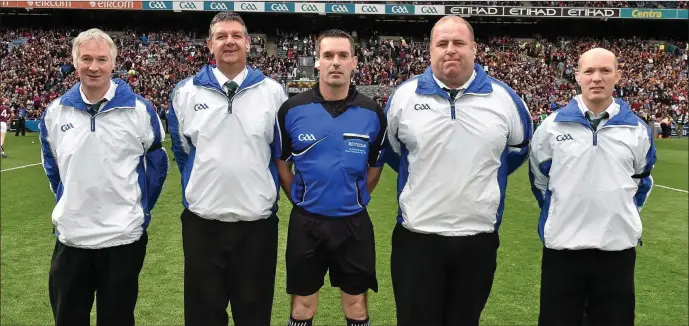  ??  ?? Ian Plunkett (second from left) before last year’s All-Ireland Senior hurling championsh­ip final with referee James Owens and his umpiring colleagues, James Dunbar, John Clarke and David Owens.
