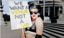  ?? AFP ?? ORGANISER Vixen Temple demonstrat­es during a sex industry workers’ rights protest at Parliament Grounds in Wellington, yesterday. |