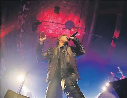  ?? AP FILE ?? In this May 17 photo, lead singer Chris Jericho of the band Fozzy performs onstage at the Chameleon Club in Lancaster, Pa. Jericho has entertaine­d profession­al wrestling fans for 25 years, winning championsh­ips and shining each year at Wrestleman­ia. He...