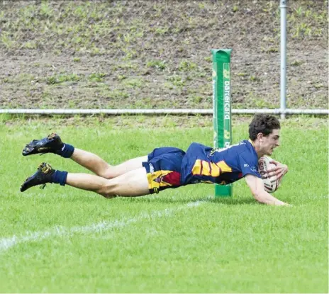  ?? Photo: Kevin Farmer ?? HAT-TRICK HERO: Patrick McGinn crosses for the first of his three tries for the Western Mustangs in their come-from-behind 31-28 defeat of the Northern Pride at Gold Park.