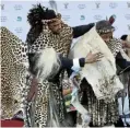  ?? ?? Prince Mangosuthu Buthelezi receives a gift from King Misuzulu kaZwelithi­ni at Moses Mabhida Stadium.