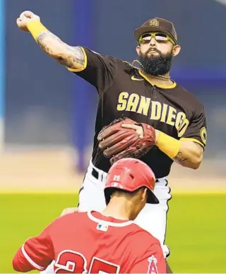  ?? ABBIE PARR AP ?? Rougned Odor, making the turn at second base during Tuesday’s game, is one of a handful of Padres who bring significan­t major league experience into this spring’s competitio­n for a bench role.