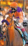  ?? The Associated Press ?? Darron Cummings
John Velazquez rides Authentic to victory Saturday in the Breeders’ Cup Classic at Keeneland Race Course.