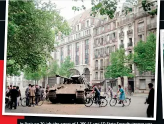  ?? ?? In Paris on 20 July the arrest of 1,200 SS and SD State Security troops was very efficientl­y organised by Lieutenant General Hans von BoinburgLe­ngsfeld, Commandant of Greater Paris. Seen here is a regular army PzKpfw V Panther on guard in a Paris street