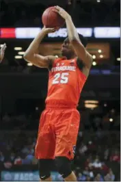  ?? JULIE JACOBSON - THE ASSOCIATED PRESS ?? Syracuse guard Tyus Battle led the way with 24points to pace the Orange to a 77-56win over Colgate at the Carrier Dome on Wednesday.