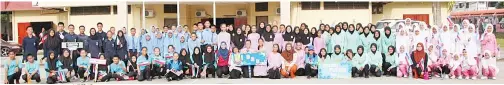  ??  ?? PESERTA perbarisan paling ramai dari SMK Beluran yang menghantar tujuh kontinjen.