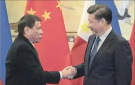  ?? Ng Han Guan Pool Photo ?? CHINESE PRESIDENT Xi Jinping, right, said, “China and the Philippine­s are neighbors across the sea and the two peoples are blood brothers.”