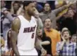  ?? TONY DEJAK, FILE — THE ASSOCIATED PRESS ?? FILE - In this file photo, fans yell at Miami Heat forward LeBron James during a game against the Cleveland Cavaliers, in Cleveland.