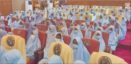  ?? Photo: Nampa/AFP ?? Relief… A group of girls previously kidnapped from their boarding school in northern Nigeria arrive at the Government House in Gusau, Zamfara State upon their release.