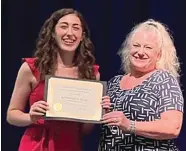  ?? Submitted photo ?? Ginger Serpas, right, Crystal Chimes Chorus’ scholarshi­p chair, presents Rebekah L. George with a certificat­e representi­ng her scholarshi­p.